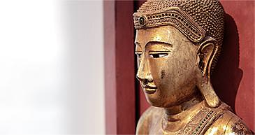 Buddha-Statue im Eingangsbereich der Praxis. / Dr. Rüdiger Hansen, Zahnarzt München